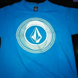 A white and blue Volcom shirt